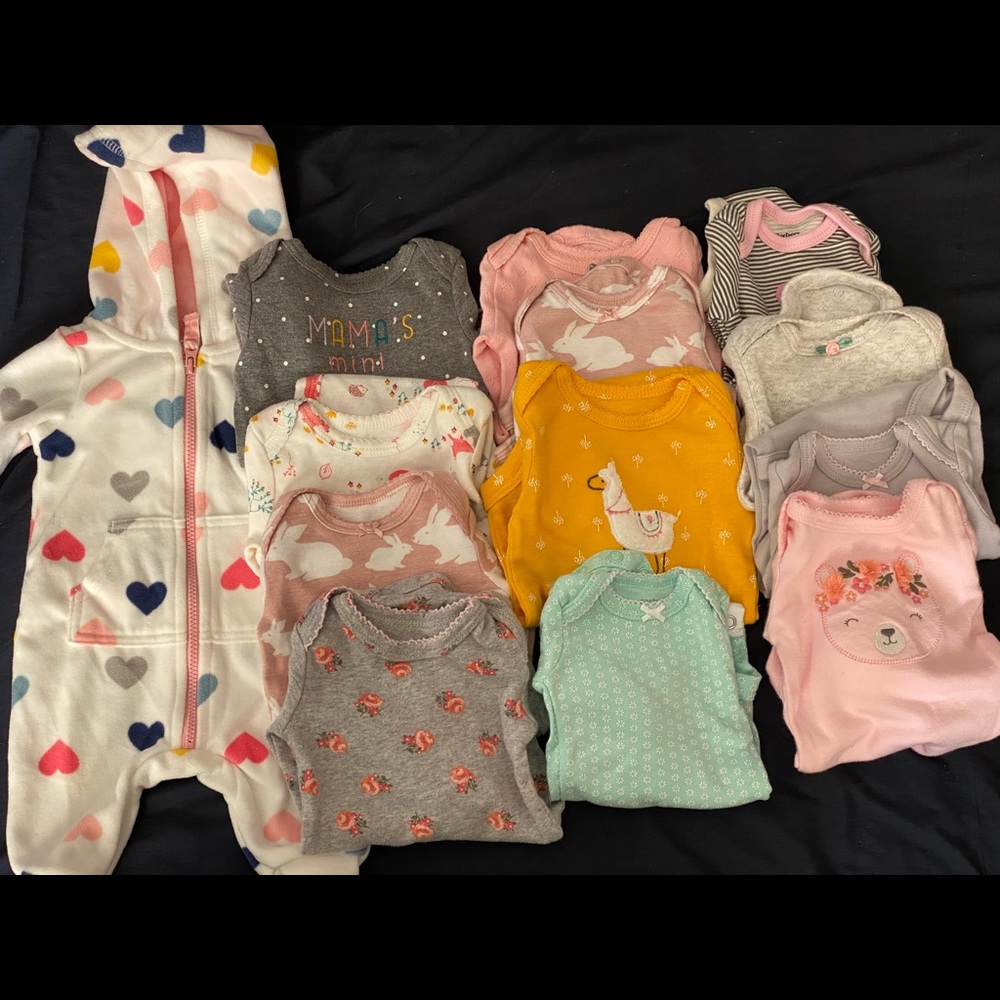 Lot of newborn onesies and sleeper